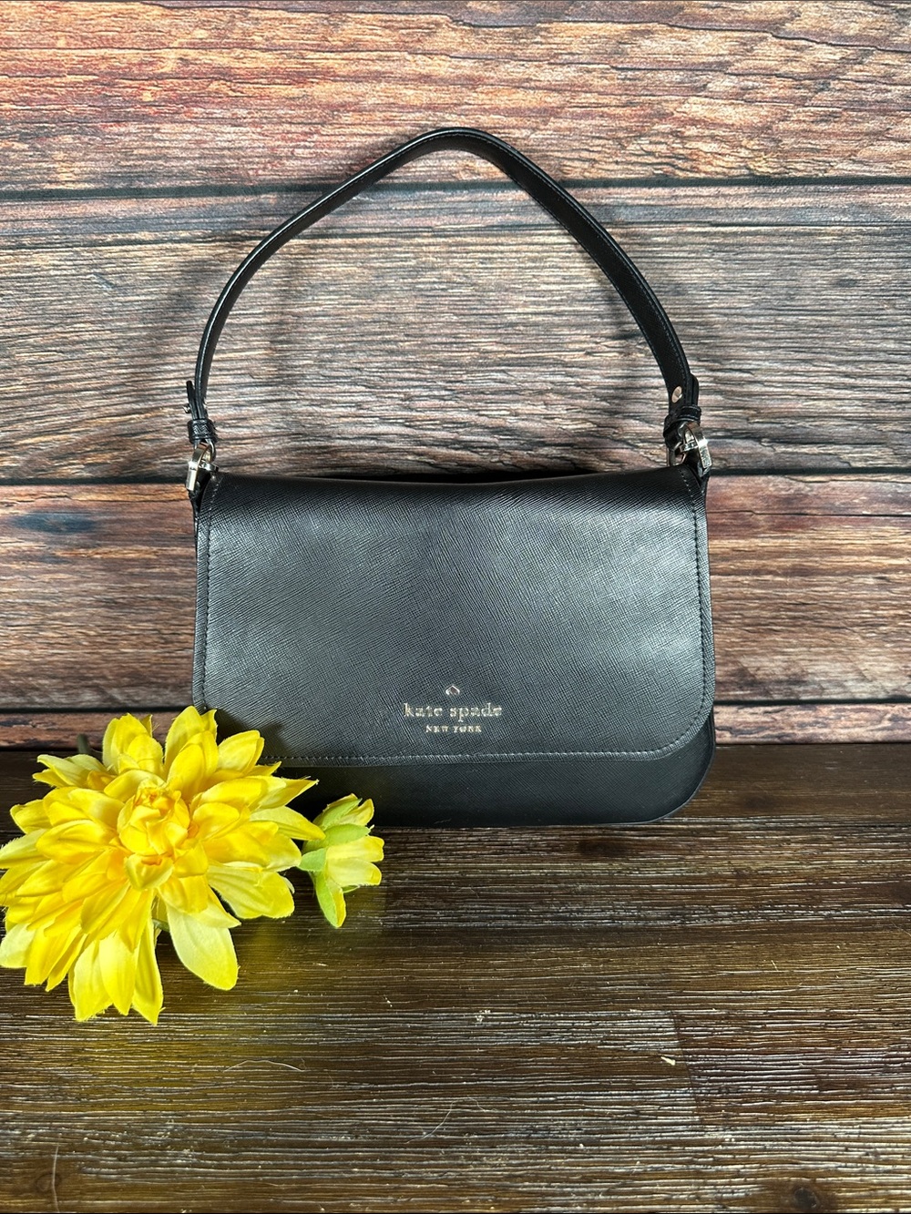 Kate Spade Staci Saffiano Leather Flap Shoulder Bag in black.